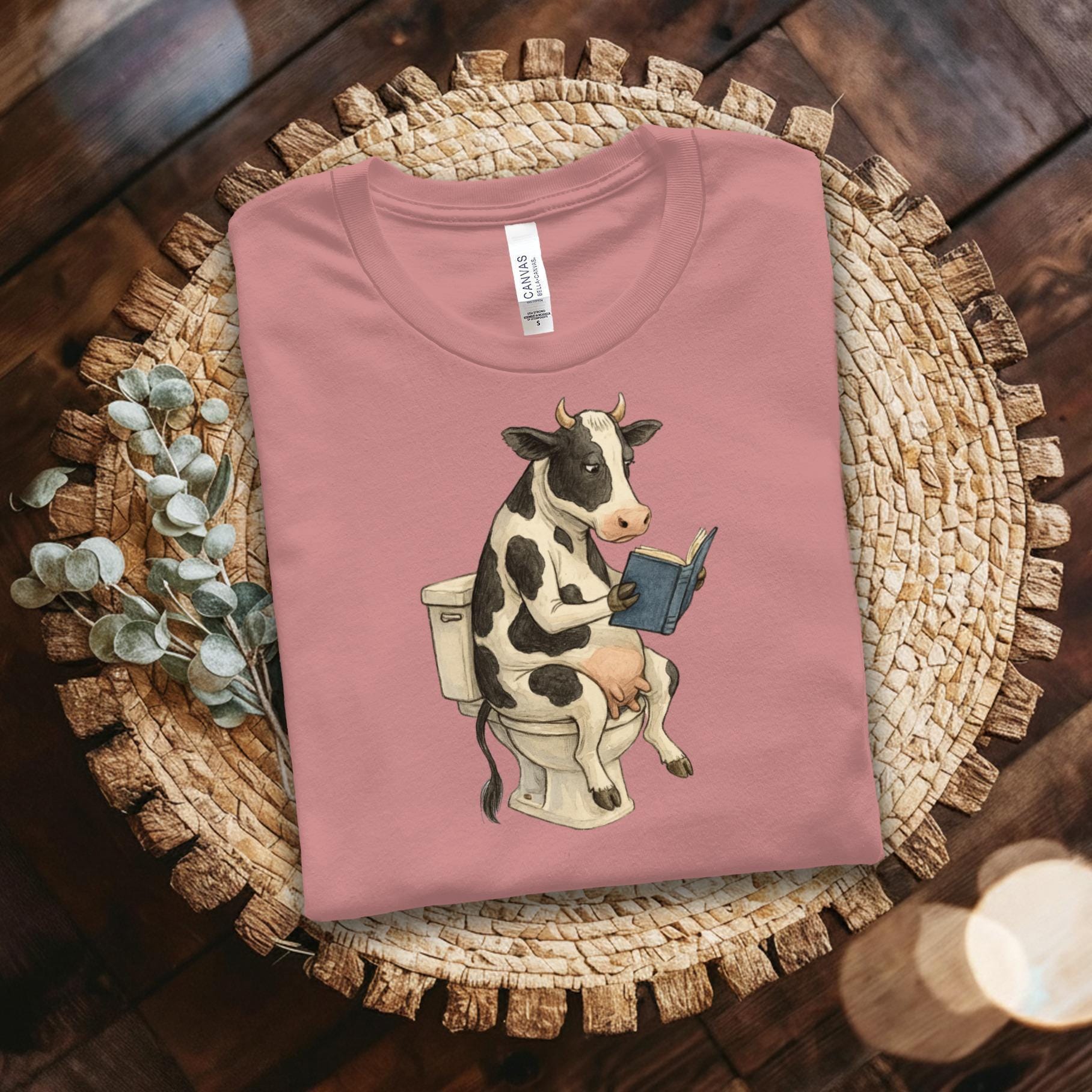 Cow Reading Book on Toilet, Funny Cow Graphic Tee, Farm Animal Lover Shirt, Quirky Cow on Toilet T-Shirt, Humorous Cow Top