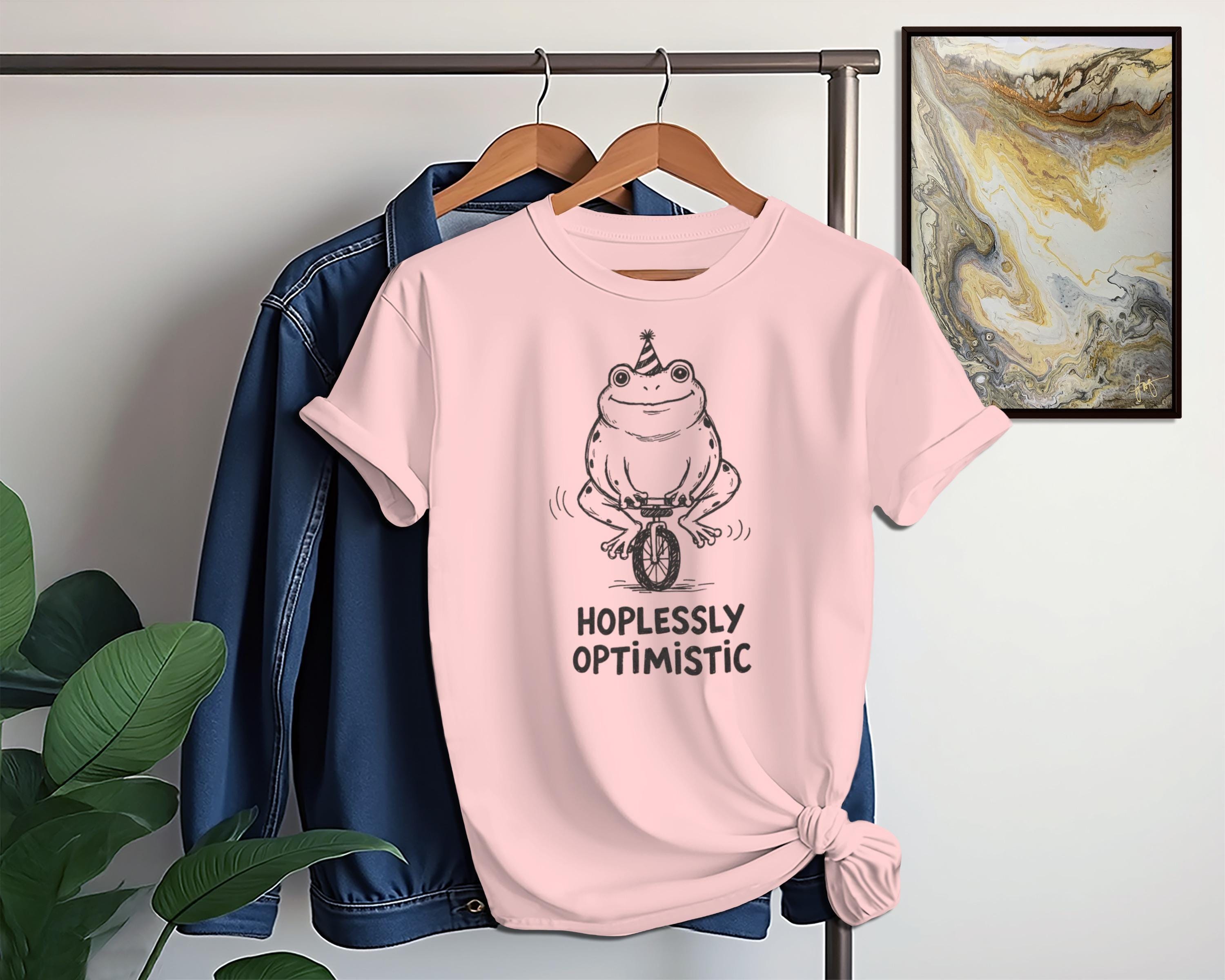 Funny Frog T-Shirt, Hopelessly Optimistic Shirt, Cute Frog Graphic Tee, Novelty Animal Shirt, Fun Casual Wear, Unique Gift Idea